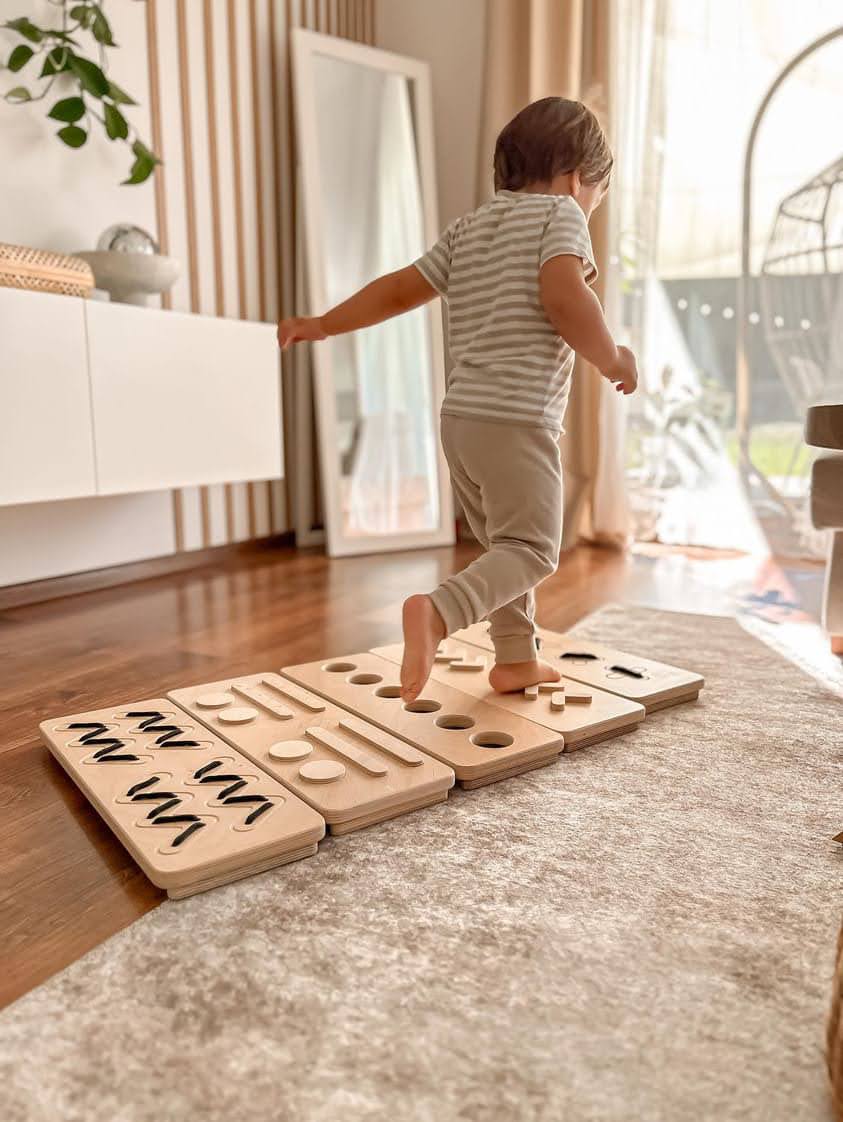 child walks through sensory path natural colutr