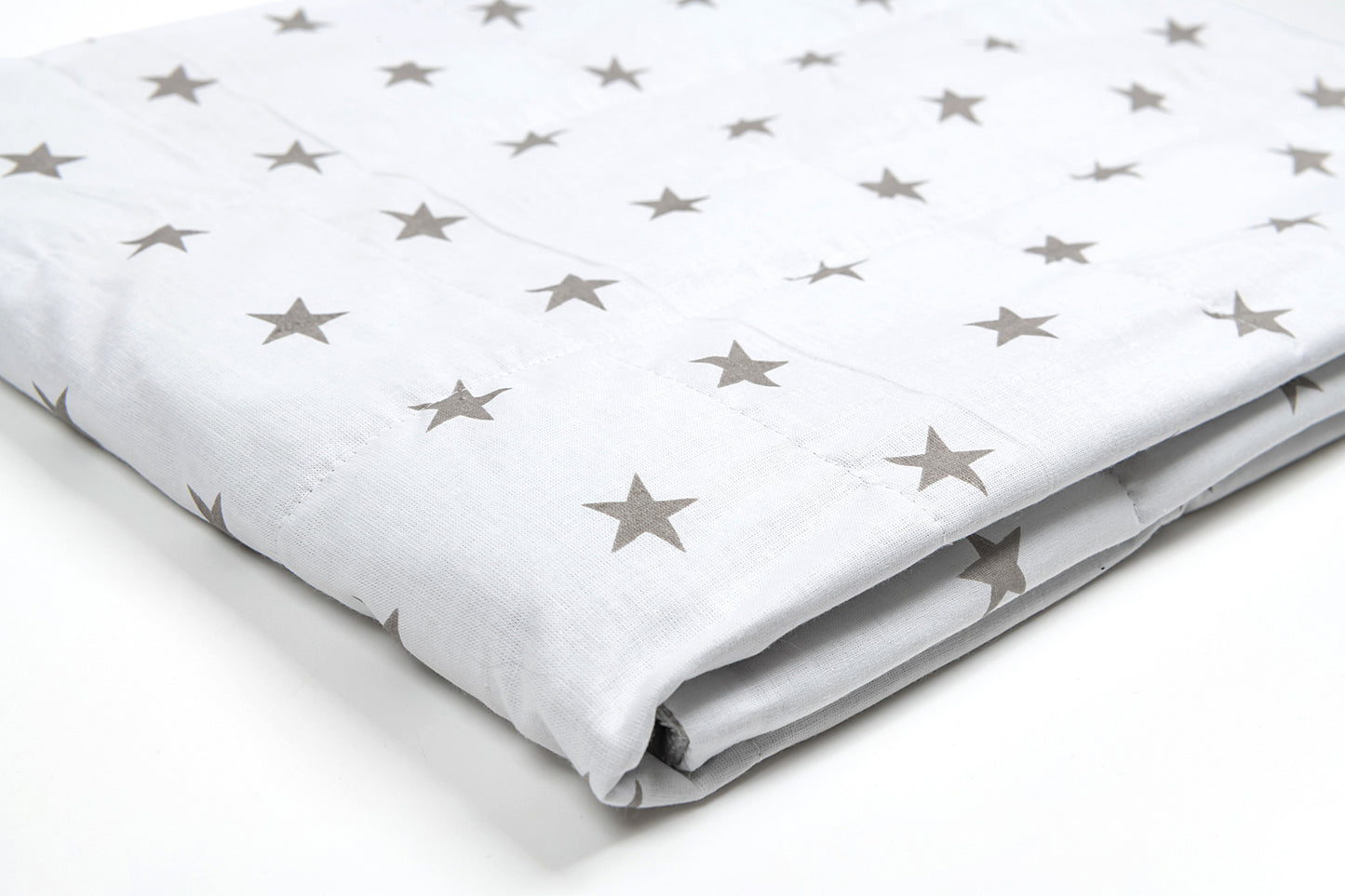 GREY STARS WEIGHTED BLANKET close up to the print