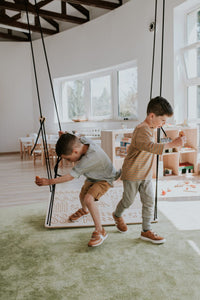 two boys swinging on SENSORY PLATFORM- GOOD WOOD