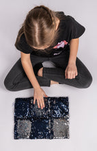 Load image into Gallery viewer, girl sitting with Two tone sequin weighted lap pillow in black and silver